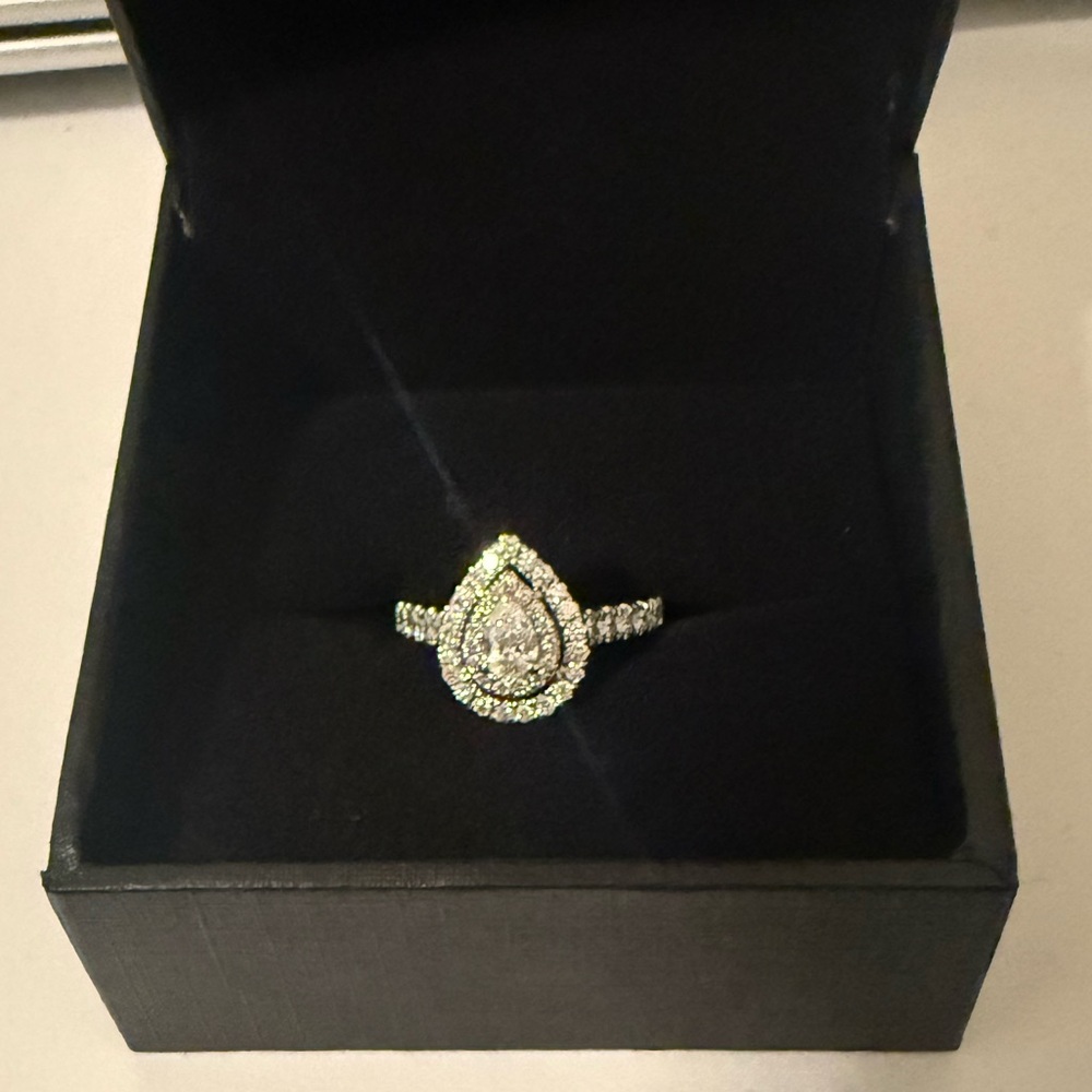 Halo pear shape white gold/ diamond engagement ring